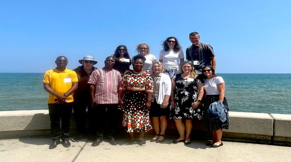 Group photo of Burkina Faso delegates, and LUC faculty and staff