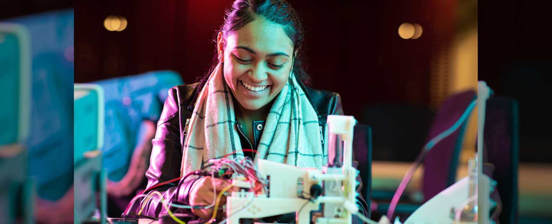 Loyola School of Education STEM scholar working in a lab