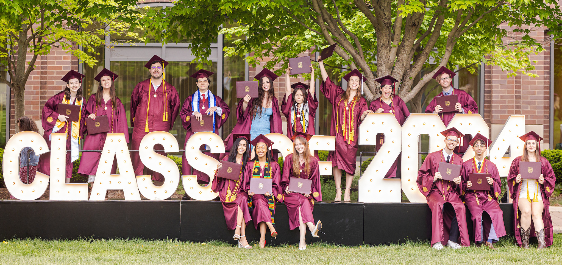 Loyola School of Education graduates celebrating at commencement