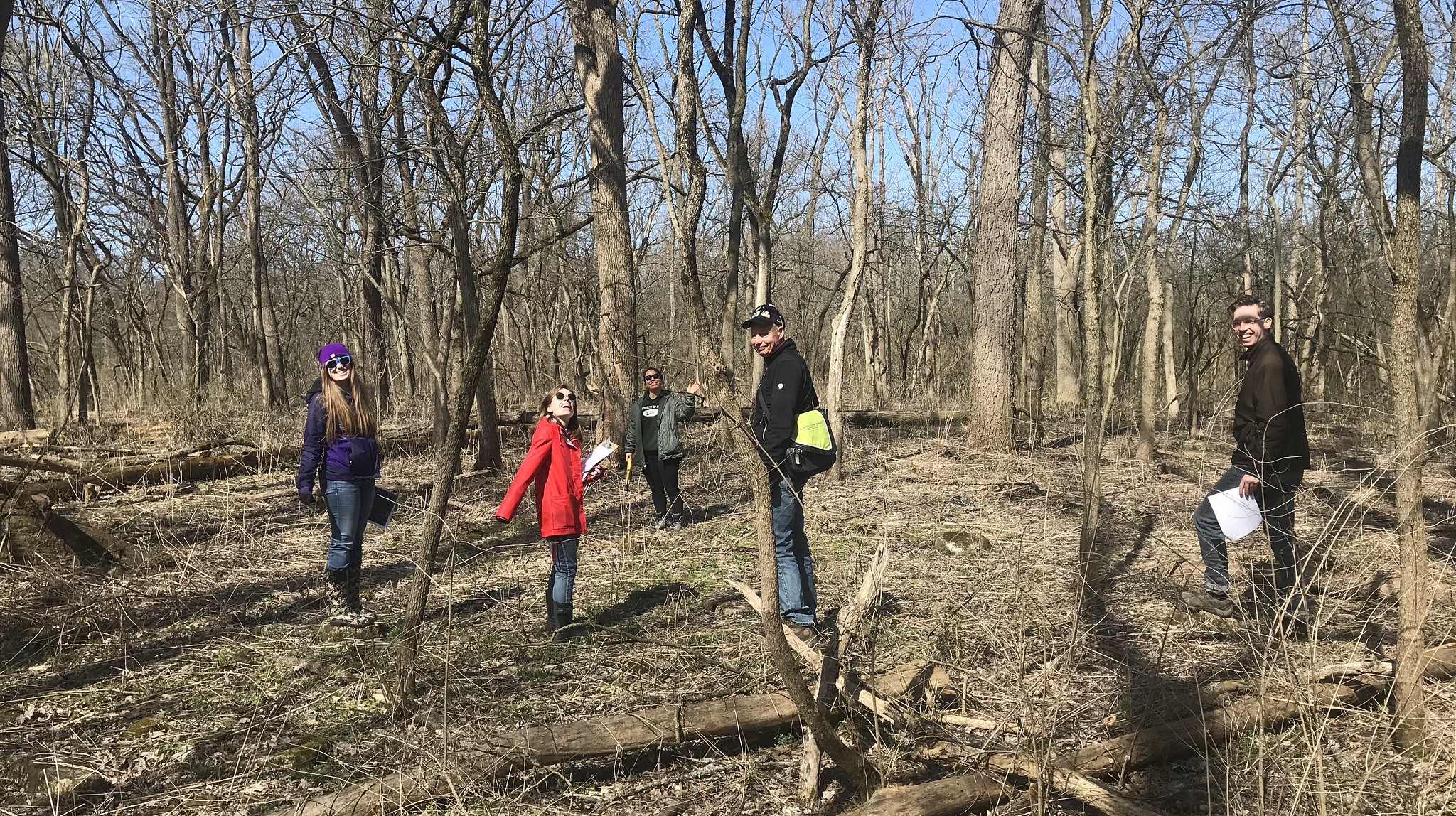 Students observing the forest preserve in winter.