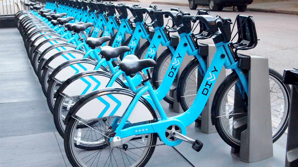 Divvy bikes lined up at a docking station.