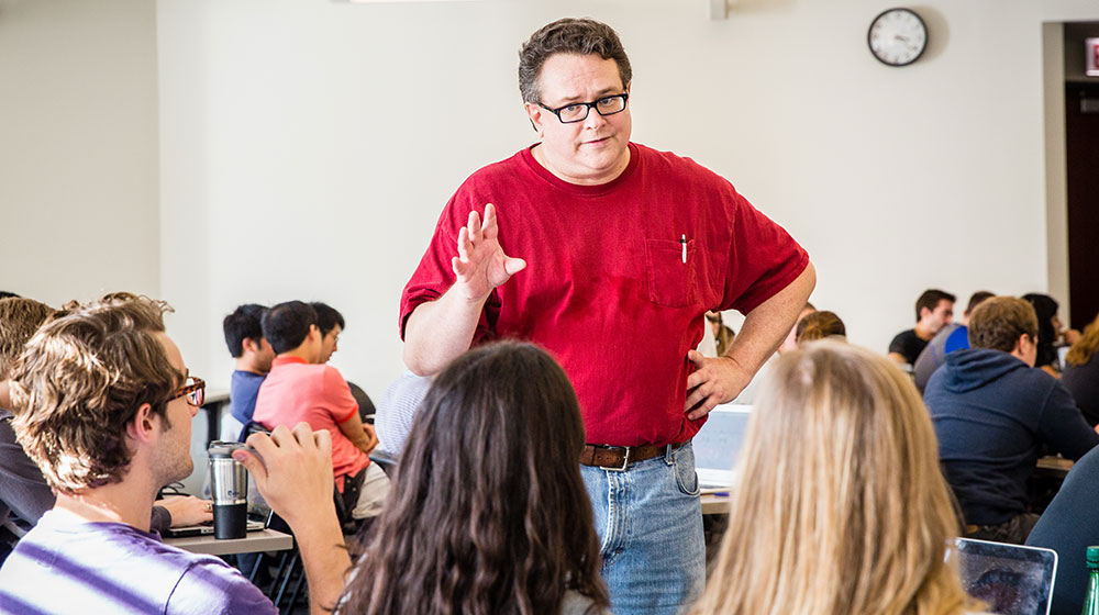 Biology professor F. Bryan Pickett makes it a point to get his students to help one another and solve problems as a team. “I think that’s one of the most important things I try to do as a professor—just get the students to work together on their learning,” he says. (Photo: Natalie Battaglia)