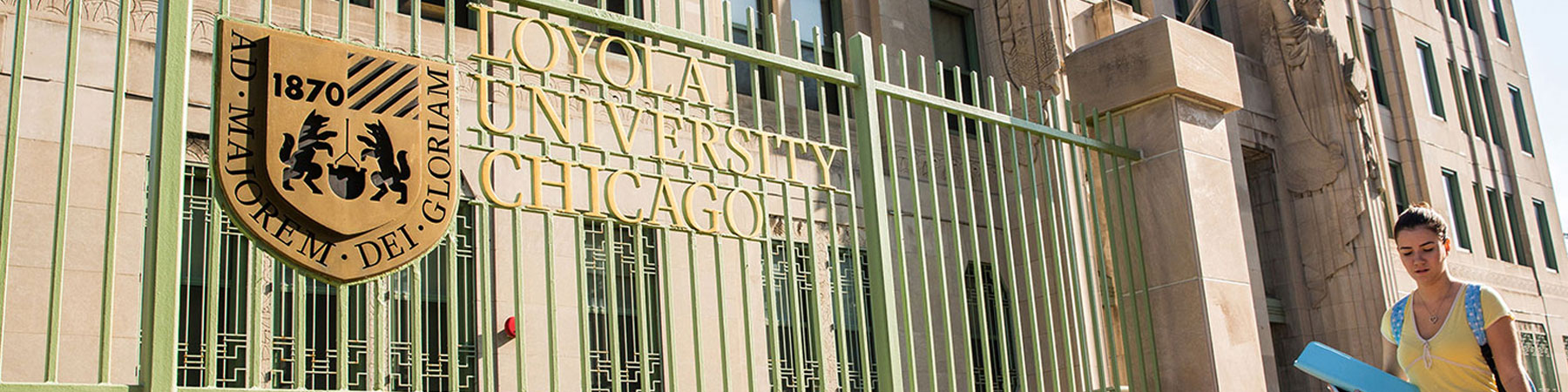 Loyola shield signage outside of Mundelein on the Lakeshore Campus