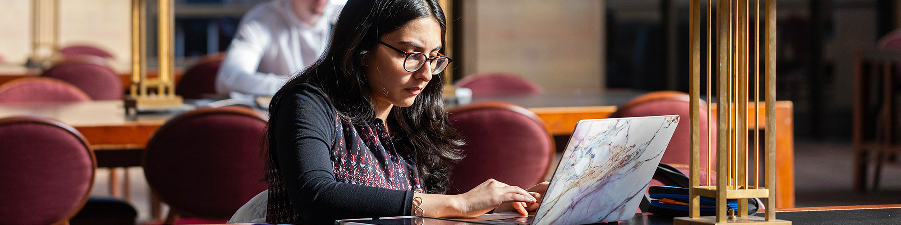 A student studies in the Cudahy Library